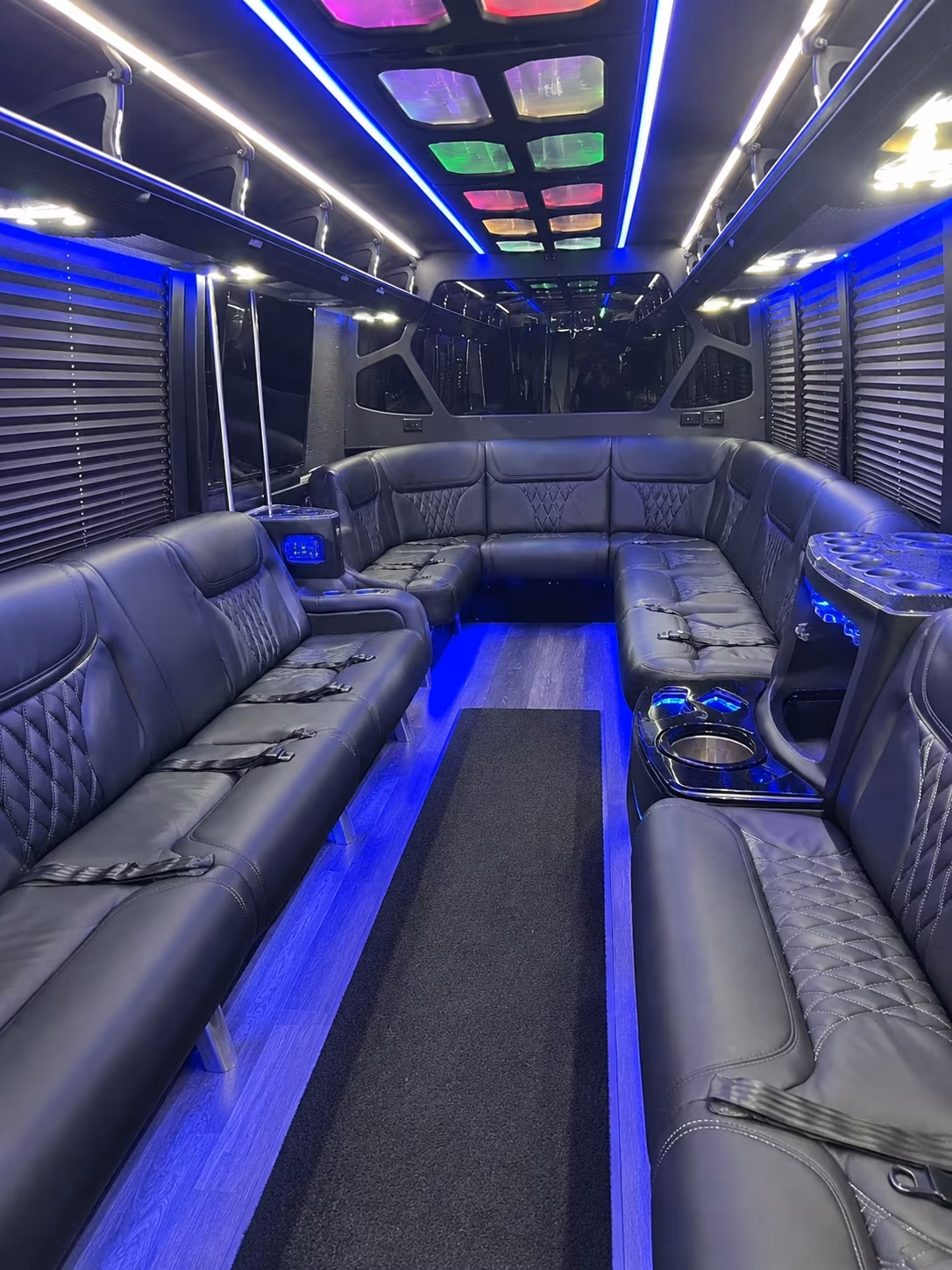 Group beside a Mercedes Sprinter limo in Pittsburgh